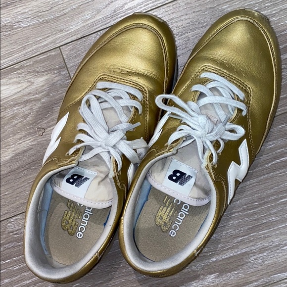 new balance 100 gold